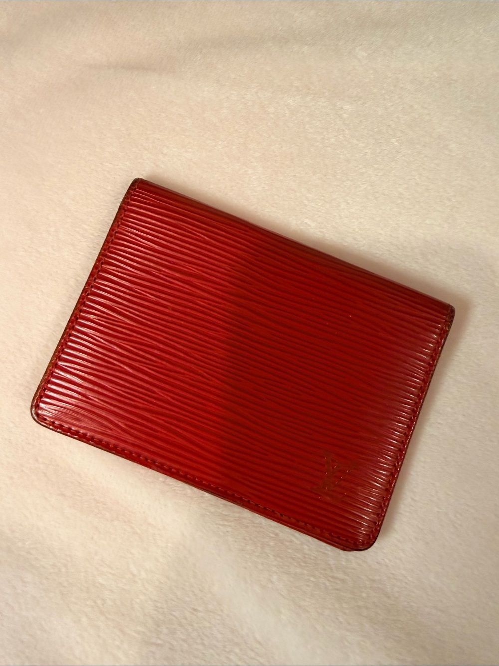 Signature Louis Vuitton textured Epi leather slim wallet